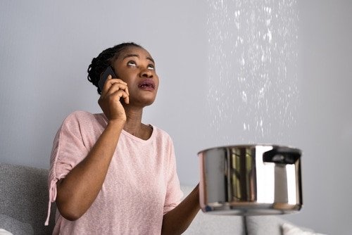 Calgary Plumbers. House Water Leak And Pipe Damage From Ceiling. Calling Plumber.