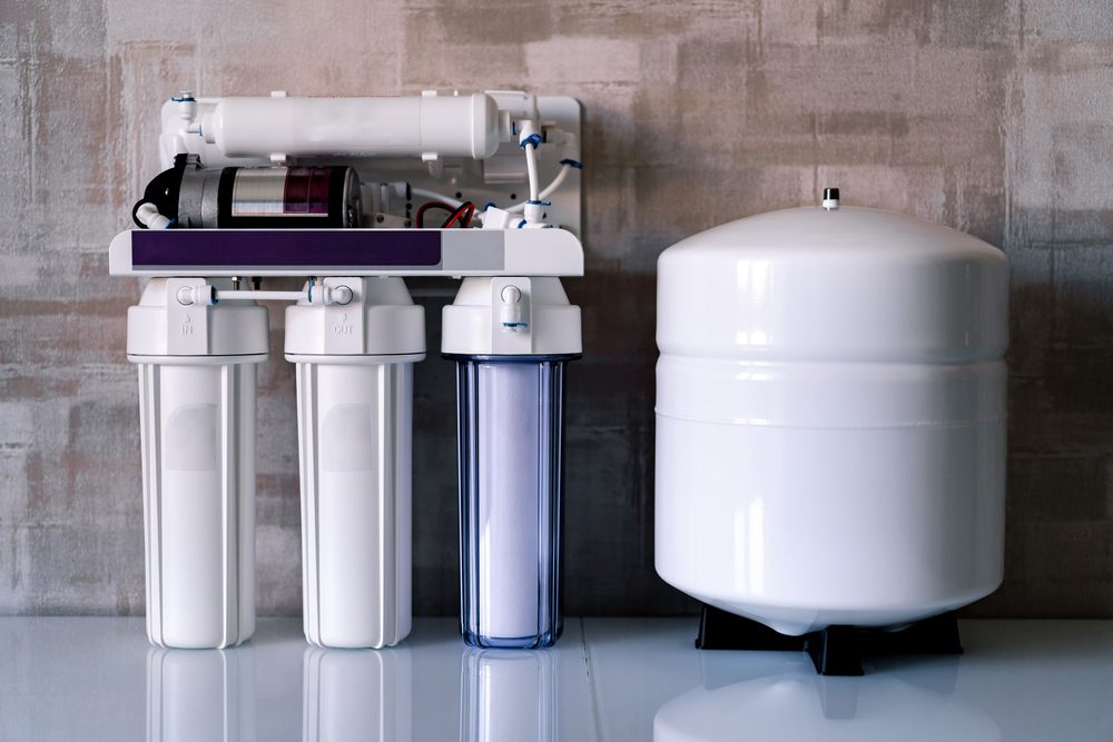 How Can Aquality Improve Your Home's Water Quality? reverse osmosis (RO) systems. Reverse osmosis water purification system at home. Installed water purification filters. Clear water concept.